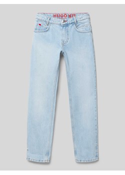 Jeansy z detalem z logo i wpuszczanymi kieszeniami ze sklepu Peek&Cloppenburg  w kategorii Spodnie dziewczęce - zdjęcie 171952671