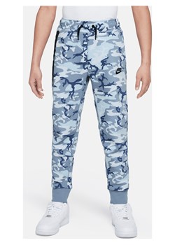 Joggery w moro dla dużych dzieci (chłopców) Nike Sportswear Tech Fleece - Niebieski ze sklepu Nike poland w kategorii Spodnie chłopięce - zdjęcie 171953084