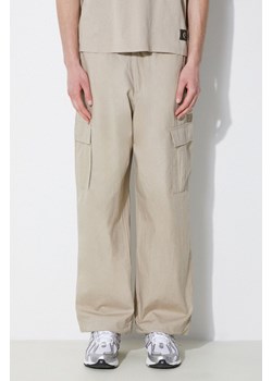 Champion spodnie bawełniane kolor beżowy w fasonie cargo 220015 ze sklepu PRM w kategorii Spodnie męskie - zdjęcie 171962670