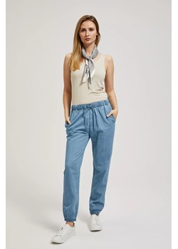 Jeansy z gumą w talii i nogawkach niebieskie ze sklepu Moodo.pl w kategorii Jeansy damskie - zdjęcie 172001413
