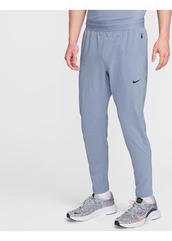 Męskie spodnie do fitnessu Dri-FIT Nike Flex Rep - Niebieski ze sklepu Nike poland w kategorii Spodnie męskie - zdjęcie 172023783