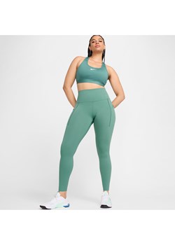 Damskie legginsy o pełnej długości z wysokim stanem i kieszeniami zapewniające średnie wsparcie Nike Universa - Zieleń ze sklepu Nike poland w kategorii Spodnie damskie - zdjęcie 172023812