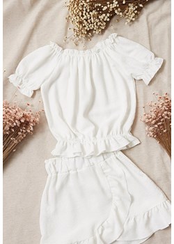 Biała Koszulka Deinehe ze sklepu Born2be Odzież w kategorii Bluzki dziewczęce - zdjęcie 172030793