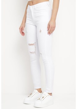 Białe Jeansy Skinny z Przetarciami i Dziurami Qloelini ze sklepu Born2be Odzież w kategorii Jeansy damskie - zdjęcie 172047131