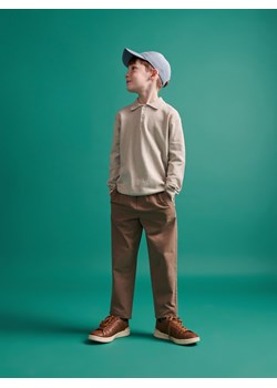 Reserved - Spodnie chino z efektem sprania - beżowy ze sklepu Reserved w kategorii Spodnie chłopięce - zdjęcie 172049713