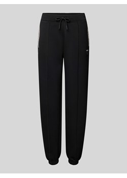 Spodnie sportowe z elastycznym pasem model ‘KIARA’ ze sklepu Peek&Cloppenburg  w kategorii Spodnie damskie - zdjęcie 172057113