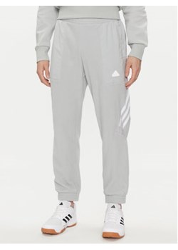adidas Spodnie dresowe Future Icons 3-Stripes IJ8860 Szary Regular Fit ze sklepu MODIVO w kategorii Spodnie męskie - zdjęcie 172061711