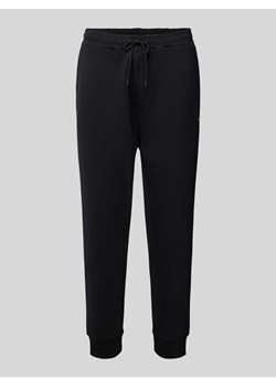 Spodnie dresowe z elastycznym pasem model ‘Hadiko’ ze sklepu Peek&Cloppenburg  w kategorii Spodnie męskie - zdjęcie 172083974