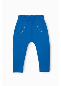 Spodnie dresowe niemowlęce  z obniżonym krokiem ze sklepu 5.10.15 w kategorii Spodnie i półśpiochy - zdjęcie 172084183