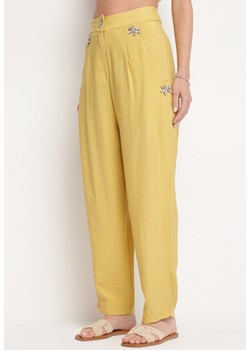 Żółte Spodnie z Wysokim Stanem i Cyrkoniami Uzilina ze sklepu Born2be Odzież w kategorii Spodnie damskie - zdjęcie 172090993