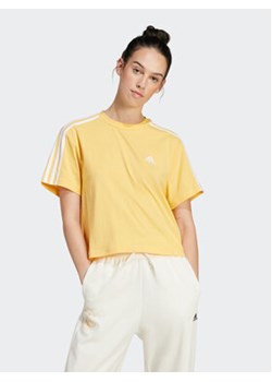 adidas T-Shirt Essentials 3-Stripes IS1575 Żółty Loose Fit ze sklepu MODIVO w kategorii Bluzki damskie - zdjęcie 172104552