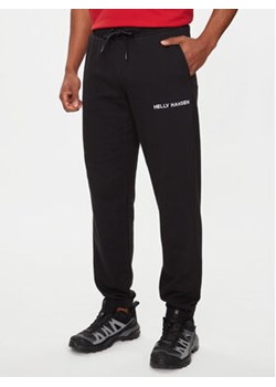 Helly Hansen Spodnie dresowe Core Sweat Pant 53926 Czarny Regular Fit ze sklepu MODIVO w kategorii Spodnie męskie - zdjęcie 172159091