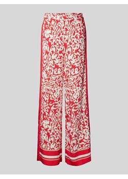 Spodnie materiałowe z szerokimi nogawkami i nadrukiem na całej powierzchni ze sklepu Peek&Cloppenburg  w kategorii Spodnie damskie - zdjęcie 172171333