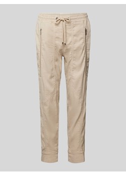 Spodnie o kroju tapered fit z kieszeniami zapinanymi na zamek błyskawiczny model ‘Future Worker’ ze sklepu Peek&Cloppenburg  w kategorii Spodnie damskie - zdjęcie 172182940
