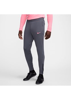 Męskie spodnie piłkarskie Dri-FIT Nike Strike - Szary ze sklepu Nike poland w kategorii Spodnie męskie - zdjęcie 172184623