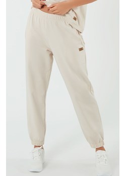 Damskie spodnie dresowe beżowe Madri, Kolor beżowy, Rozmiar S, Italian Fashion ze sklepu Intymna w kategorii Spodnie damskie - zdjęcie 172185522