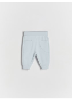 Reserved - Dzianinowe spodnie z kieszeniami - jasnoniebieski ze sklepu Reserved w kategorii Spodnie i półśpiochy - zdjęcie 172189882