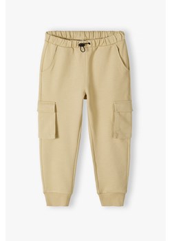 Spodnie dresowe bojówki - beżowe - Limited Edition ze sklepu 5.10.15 w kategorii Spodnie chłopięce - zdjęcie 172195694
