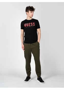 Guess T-Shirty "Malco" | X2RI05KAK91 | Mężczyzna | Czarny ze sklepu ubierzsie.com w kategorii Spodnie męskie - zdjęcie 172248833