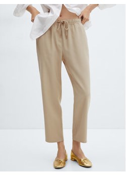 Mango Spodnie materiałowe Fluido 67085723 Beżowy Regular Fit ze sklepu MODIVO w kategorii Spodnie damskie - zdjęcie 172268551