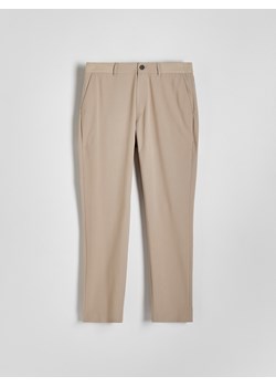 Reserved - Spodnie slim fit - beżowy ze sklepu Reserved w kategorii Spodnie męskie - zdjęcie 172290693