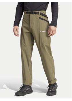 adidas Spodnie outdoor Terrex Xperior IK3533 Khaki Regular Fit ze sklepu MODIVO w kategorii Spodnie męskie - zdjęcie 172296374