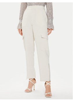 Karen by Simonsen Spodnie materiałowe Nina10104876 Beżowy Straight Fit ze sklepu MODIVO w kategorii Spodnie damskie - zdjęcie 172325781