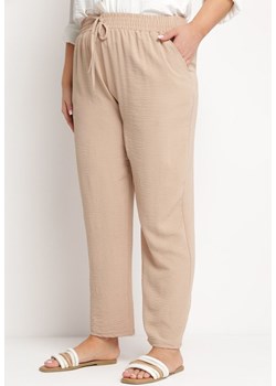 Beżowe Spodnie Wiązane Troczkiem w Pasie z Kieszeniami Jeoolia ze sklepu Born2be Odzież w kategorii Spodnie damskie - zdjęcie 172339471