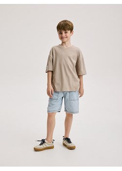 Reserved - T-shirt oversize z naszywką - beżowy ze sklepu Reserved w kategorii T-shirty chłopięce - zdjęcie 172353120