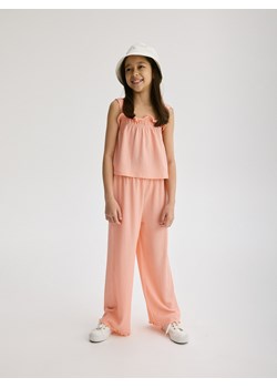 Reserved - Spodnie z szerokimi nagawkami - pomarańczowy ze sklepu Reserved w kategorii Spodnie dziewczęce - zdjęcie 172357314
