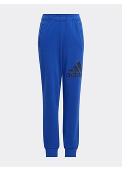 adidas Spodnie dresowe w kolorze niebieskim ze sklepu Limango Polska w kategorii Spodnie chłopięce - zdjęcie 172373800
