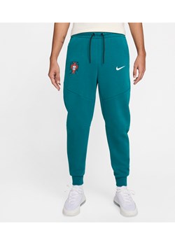 Męskie joggery piłkarskie Nike Portugalia Tech Fleece - Zieleń ze sklepu Nike poland w kategorii Spodnie męskie - zdjęcie 172407181