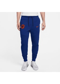 Męskie joggery piłkarskie Nike Holandia Tech Fleece - Niebieski ze sklepu Nike poland w kategorii Spodnie męskie - zdjęcie 172407190