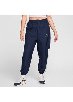 Damskie joggery z tkaniny Nike Sportswear - Niebieski ze sklepu Nike poland w kategorii Spodnie damskie - zdjęcie 172407281