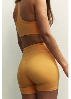 H & M - Krótkie legginsy sportowe DryMove - Pomarańczowy ze sklepu H&M w kategorii Szorty - zdjęcie 172407754