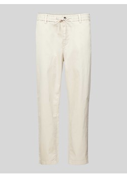Chinosy o kroju tapered fit z elastycznym pasem ze sklepu Peek&Cloppenburg  w kategorii Spodnie męskie - zdjęcie 172417513