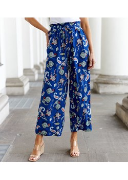 Niebieskie szerokie spodnie w kwiaty Palermo ze sklepu gemre w kategorii Spodnie damskie - zdjęcie 172428612
