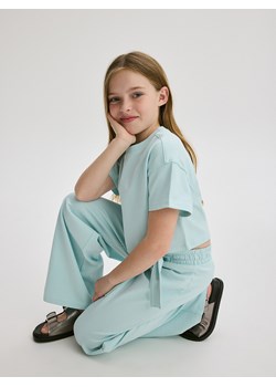 Reserved - Bawełniane spodnie - jasnoturkusowy ze sklepu Reserved w kategorii Spodnie dziewczęce - zdjęcie 172432350