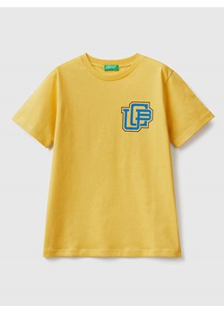Benetton Koszulka w kolorze żółtym ze sklepu Limango Polska w kategorii T-shirty chłopięce - zdjęcie 172436253