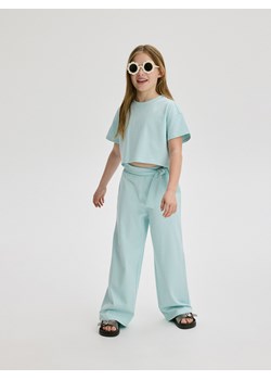 Reserved - Bawełniane spodnie - jasnoturkusowy ze sklepu Reserved w kategorii Spodnie dziewczęce - zdjęcie 172440390