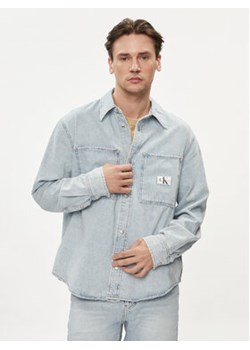 Calvin Klein Jeans Koszula jeansowa Linear J30J324894 Błękitny Regular Fit ze sklepu MODIVO w kategorii Koszule męskie - zdjęcie 172447572