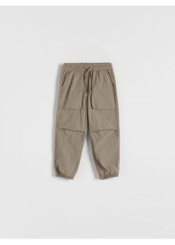 Reserved - Joggery z kieszeniami - brązowy ze sklepu Reserved w kategorii Spodnie i półśpiochy - zdjęcie 172530171