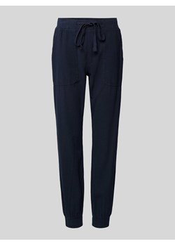 Spodnie sportowe w jednolitym kolorze model ‘KANAYA’ ze sklepu Peek&Cloppenburg  w kategorii Spodnie damskie - zdjęcie 172546512