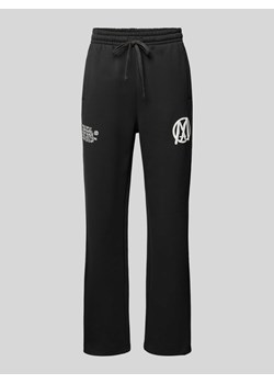 Spodnie dresowe o kroju regular fit z nadrukiem z logo ze sklepu Peek&Cloppenburg  w kategorii Spodnie męskie - zdjęcie 172546662