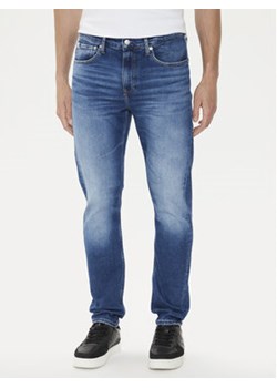 Calvin Klein Jeans Jeansy J30J325889 Niebieski Slim Fit ze sklepu MODIVO w kategorii Jeansy męskie - zdjęcie 172550411