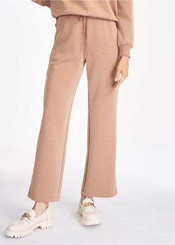 Szerokie spodnie dresowe damskie ze sklepu OCHNIK w kategorii Spodnie damskie - zdjęcie 172555722