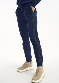 Spodnie dresowe z lampasami damskie ze sklepu OCHNIK w kategorii Spodnie damskie - zdjęcie 172561283