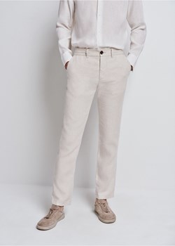 Beżowe lniane spodnie męskie ze sklepu OCHNIK w kategorii Spodnie męskie - zdjęcie 172563324