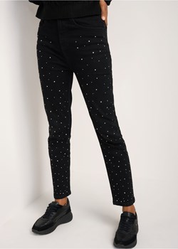 Czarne jeansy z kryształkami damskie ze sklepu OCHNIK w kategorii Spodnie damskie - zdjęcie 172571884