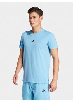 adidas Koszulka techniczna Designed for Training IS3830 Błękitny Slim Fit ze sklepu MODIVO w kategorii T-shirty męskie - zdjęcie 172591733